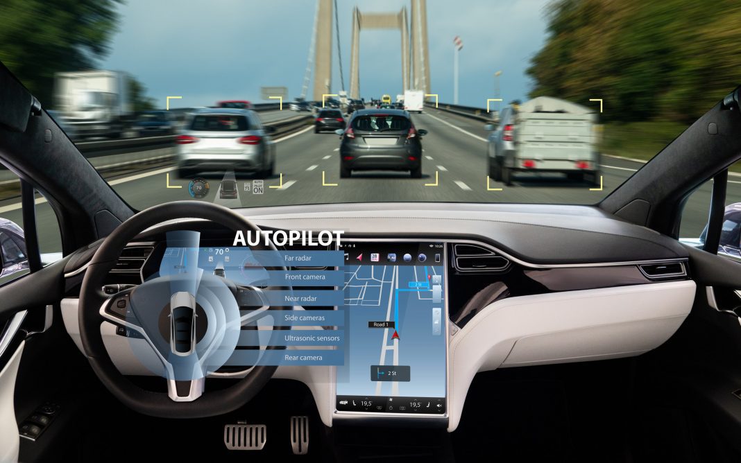 Self driving car on a road. Autonomous vehicle. Inside view.