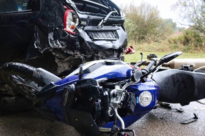 accident-g3450e7cfc_1280 Crashed vehicle and motorcycle along the road following incident