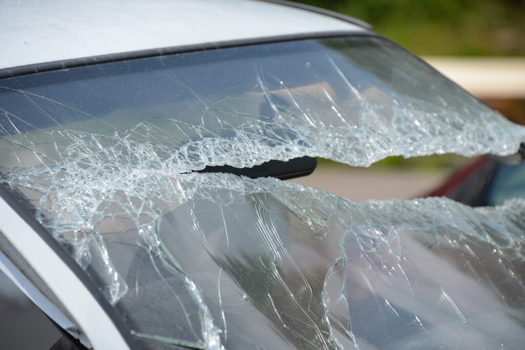 Broken windshield of crash vehicle 