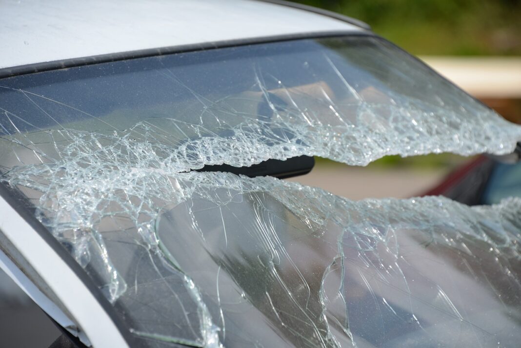 Broken windshield of crash vehicle