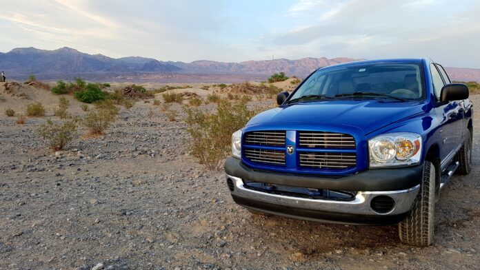 dreamstime_l_114488158 Blue Dodge Ram truck featured on road