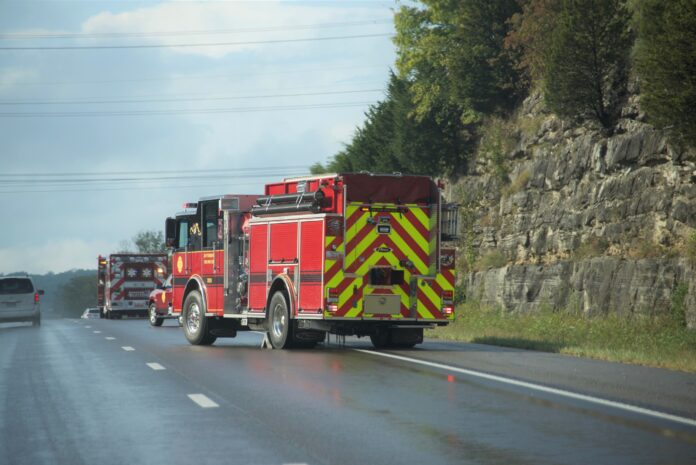 dreamstime_l_128721750 Emergency medics arrive to scene of a crash