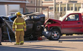 Paradise Hills Hit-And-Run Kills Two, Injures Two Emergency medic assists victims of accident