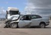 Semi truck altercation with crashed car on freeway