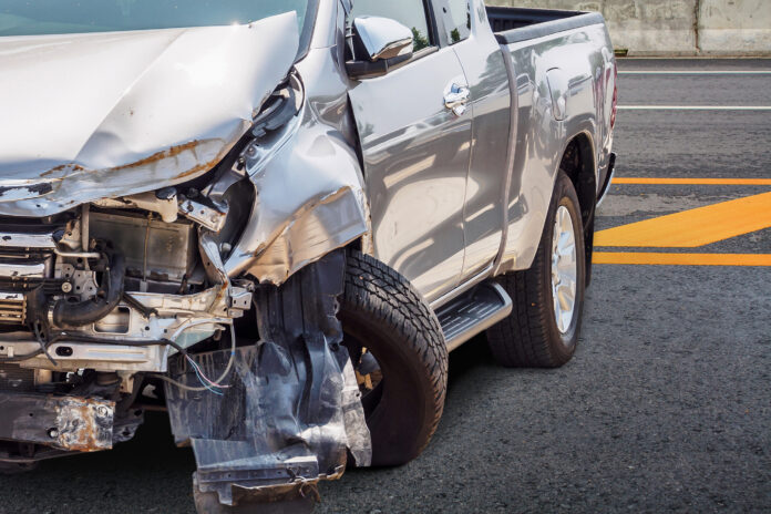 dreamstime_l_193199807 Silver pickup truck severely crashed after accident
