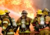 Five firefighters struggle to put out structure fire
