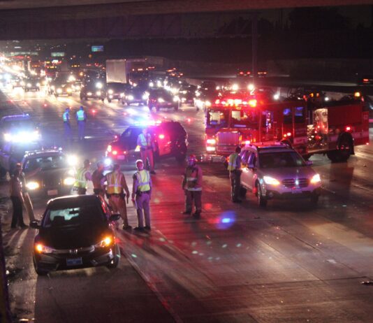 Emergency response team respond to early morning car crash