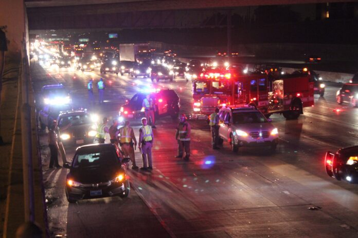 dreamstime_l_79820816 Emergency response team respond to early morning car crash