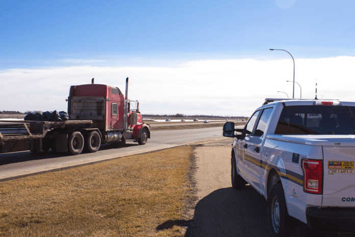 image (2) Semitrailer depicted on highway
