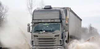 Semi trailer driving along highway