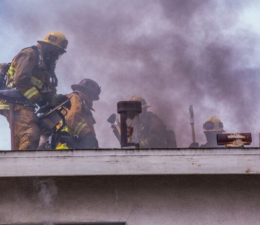 Oceanside Home Fire Causes Evacuations firefighters attempting to put out a large house fire