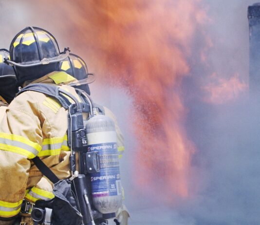 Body Found After Agua Caliente House Fire firemen attempt to put out large house fire