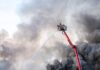 East County House Fire Kills One firemen putting out large house fire