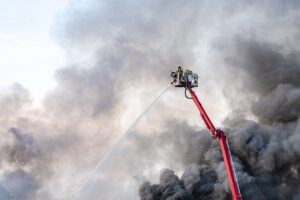 firemen putting out large house fire