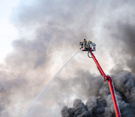 East County House Fire Kills One firemen putting out large house fire