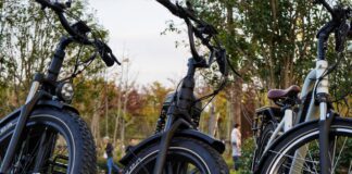 multiple e-bikes depicted on bike rack