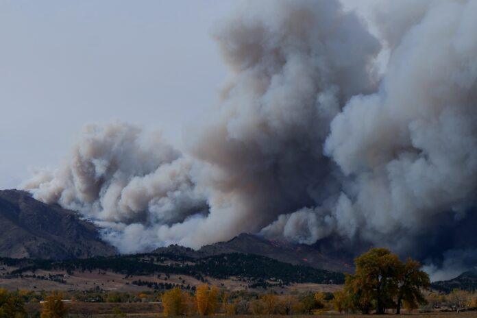 wildfire-smoke large wildfire smoke clouds depicted in the distance