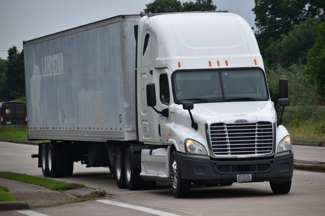 semi truck depicted driving on highway