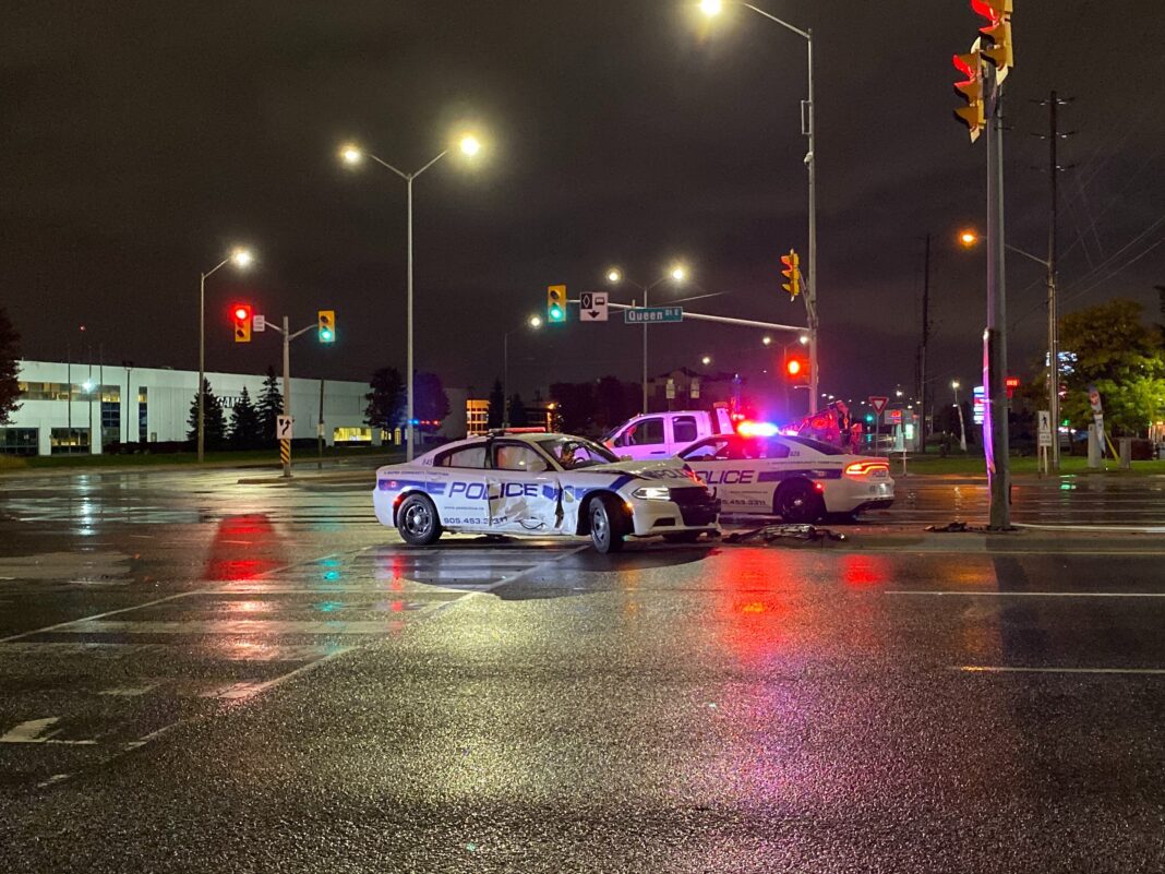 police car struck by vehicle