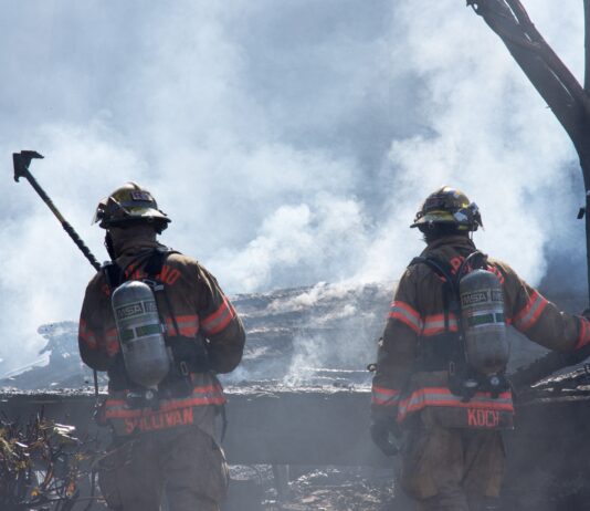 Maui Fire Threatens Homes, Kills 114 People firefighters attempt to put out large fire