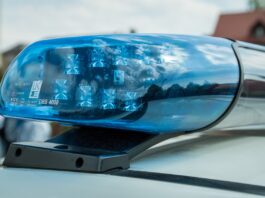 police siren depicted at scene of incident