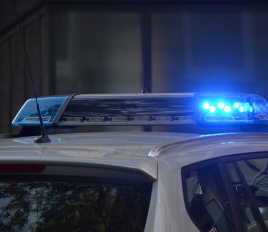 police car depicted after arriving to scene of incident