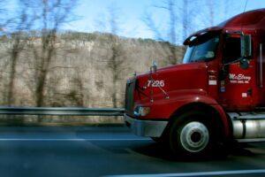 semi-truck depicted driving on highway