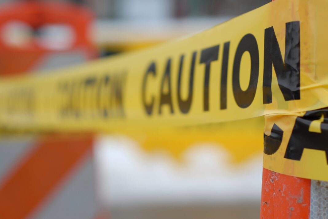 caution tape depicted in hazardous area