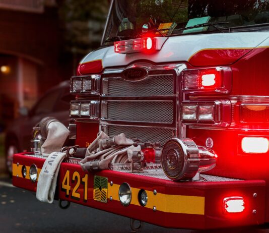 fire truck depicted at house fire