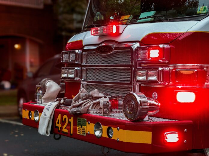 fire truck depicted at house fire