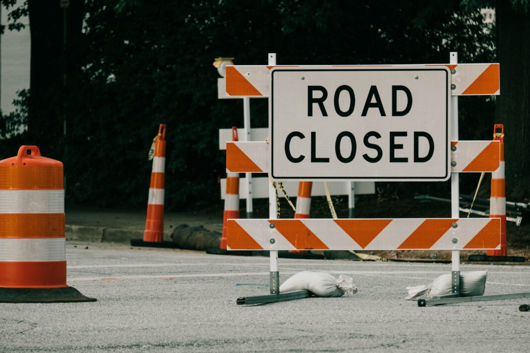 road closure sign depicted at scene of accident