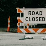 road closure sign depicted at scene of accident