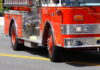 fire truck arrives to scene of building fire