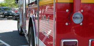 fire engine assists at scene of house fire