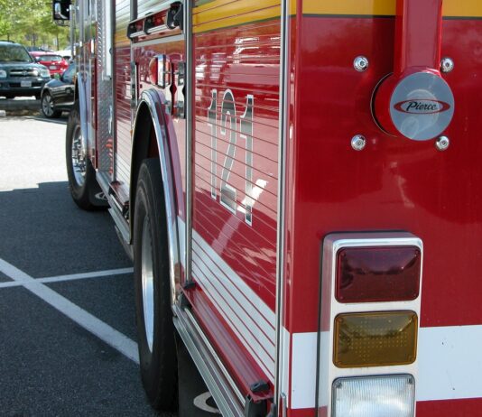 fire engine assists at scene of house fire
