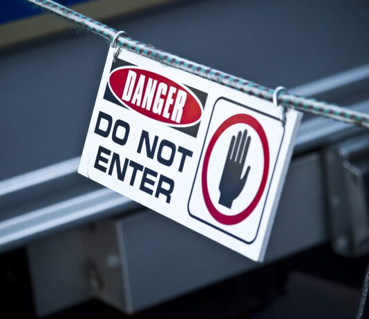 danger sign depicted outside of gas leak
