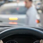 car striking pedestrian
