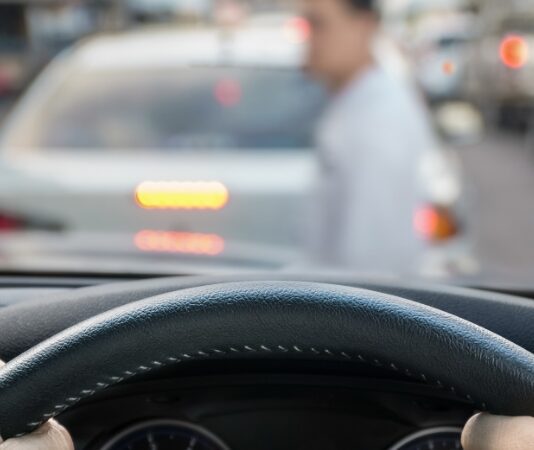 car striking pedestrian